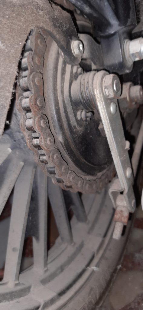 Is Chain Wax Better than Lube? Picture showing dirty chain. 